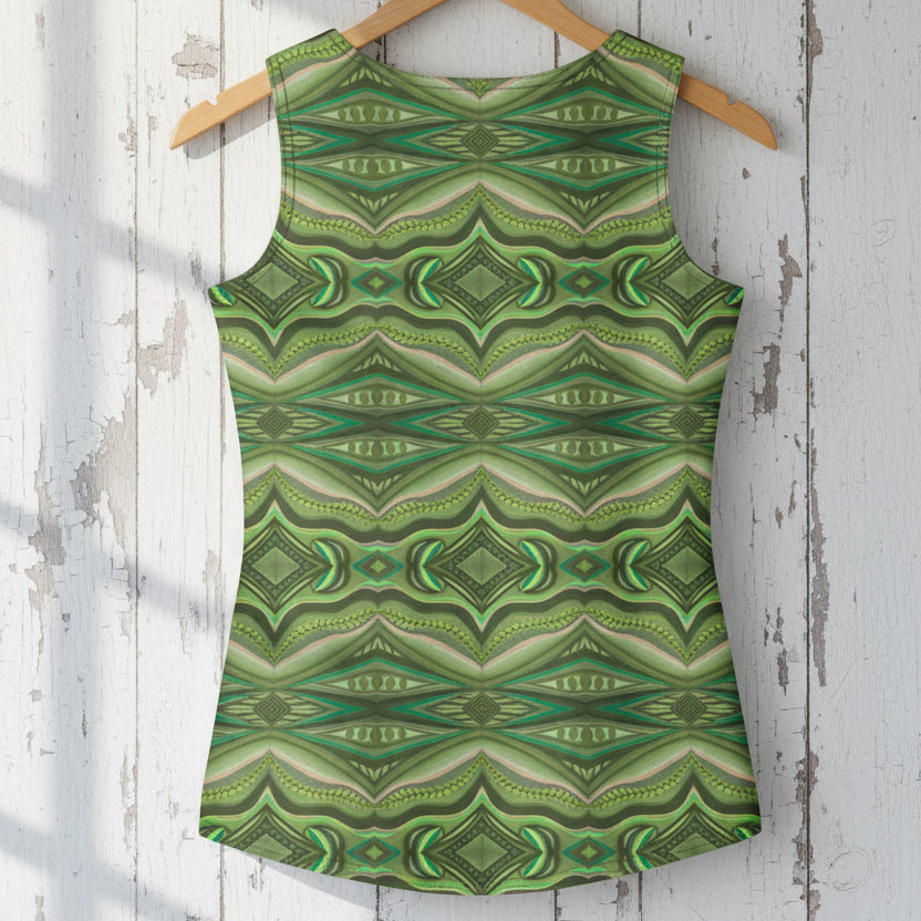 Green patterned tank top on a wooden hanger against a rustic white wooden background